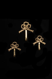 1960s Hollywood Regency Brass Bow Hooks Trio