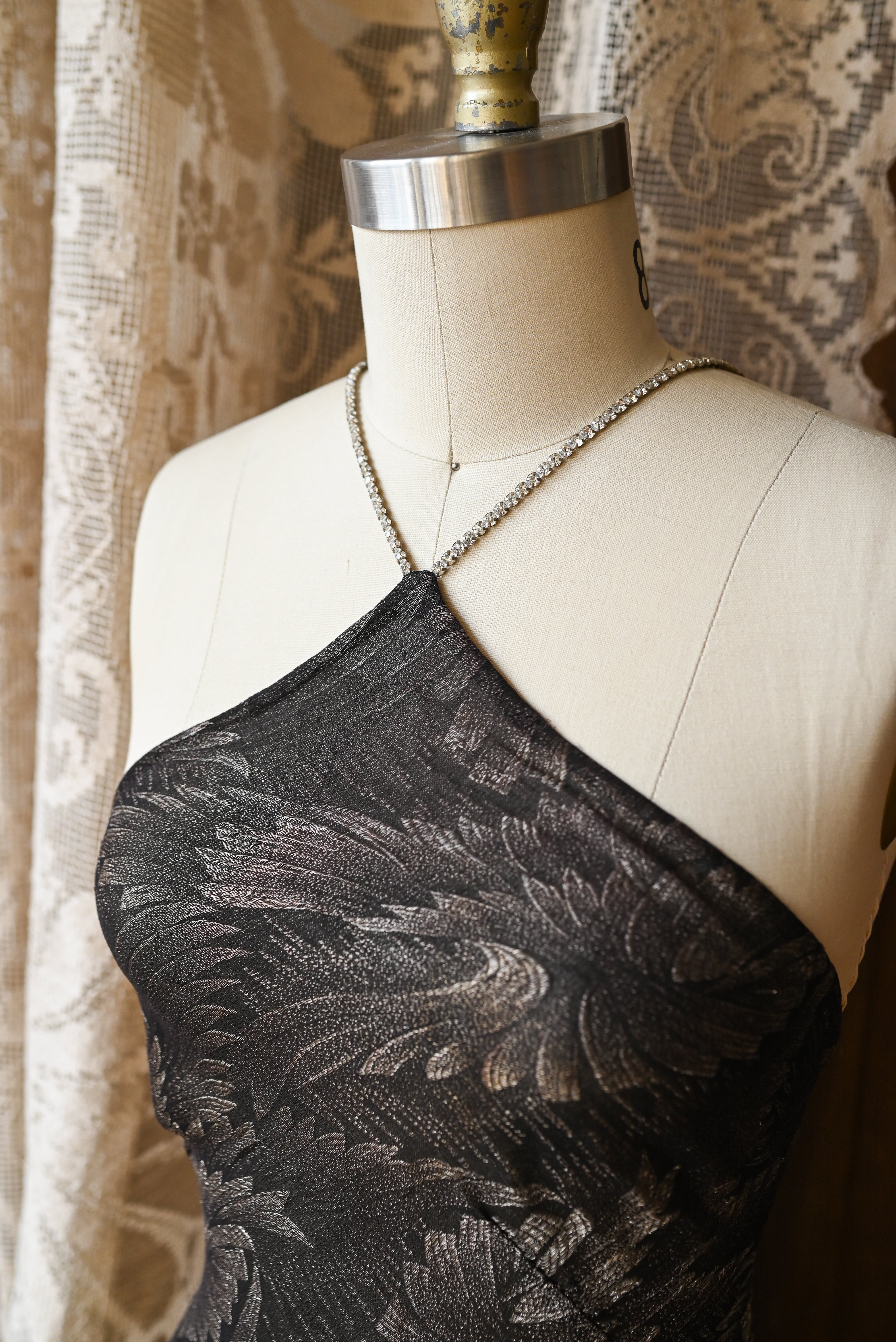 Demetra's Silver Lamé Diamanté Halter Gown