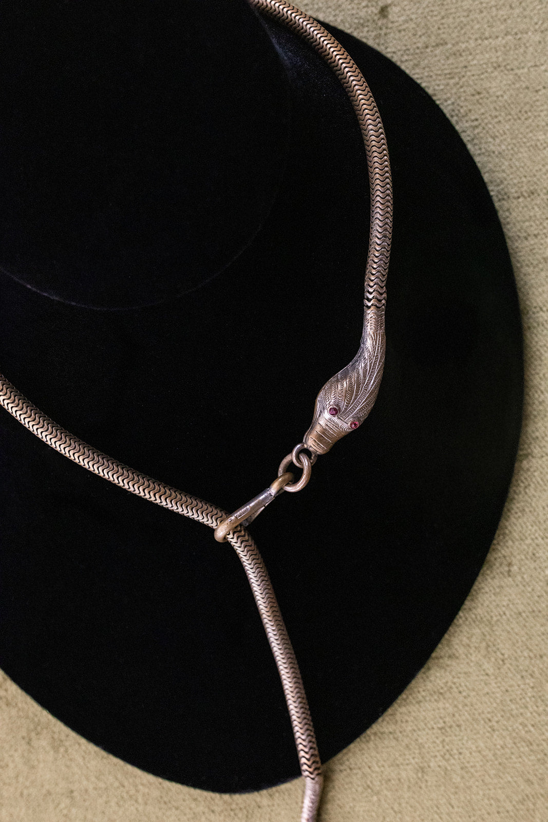 1920s Silver Wash Brass Snake Lariat with Ruby Eyes