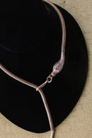 1920s Silver Wash Brass Snake Lariat with Ruby Eyes