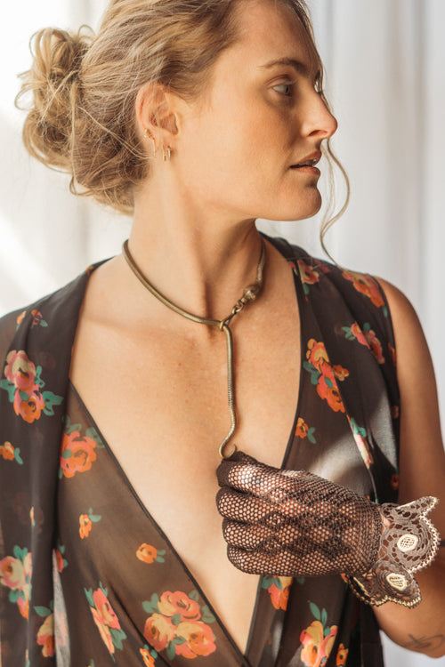 1920s Silver Wash Brass Snake Lariat with Ruby Eyes